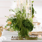fresh‑green‑white‑artificial‑floral‑centerpiece‑glass‑candle‑holder‑background