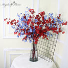 red‑blue‑artificial‑orchid‑branches‑glass‑vase‑display