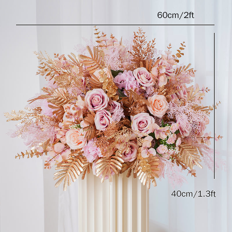Romantic wedding tablescape with candles and blush flowers